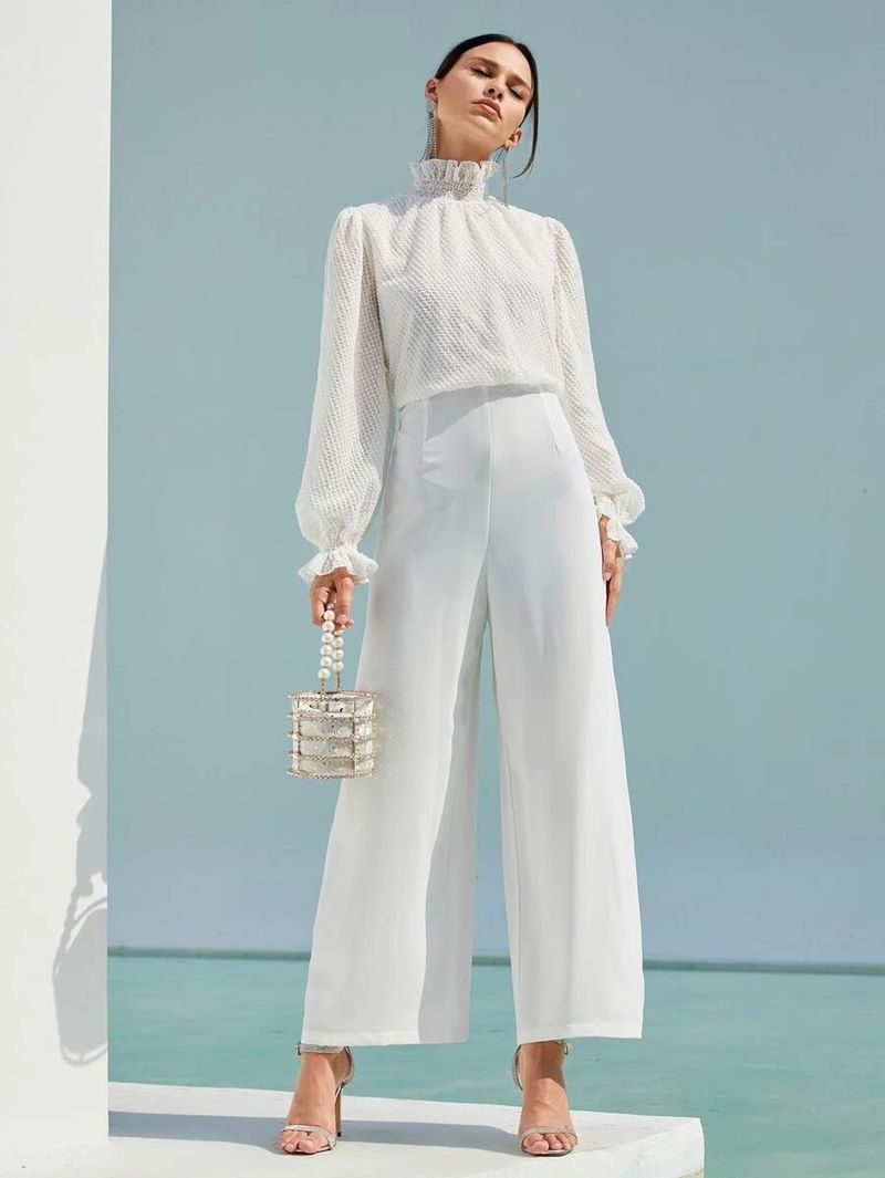 Što odjenuti na bijelu zabavu: elegantan kombinezon