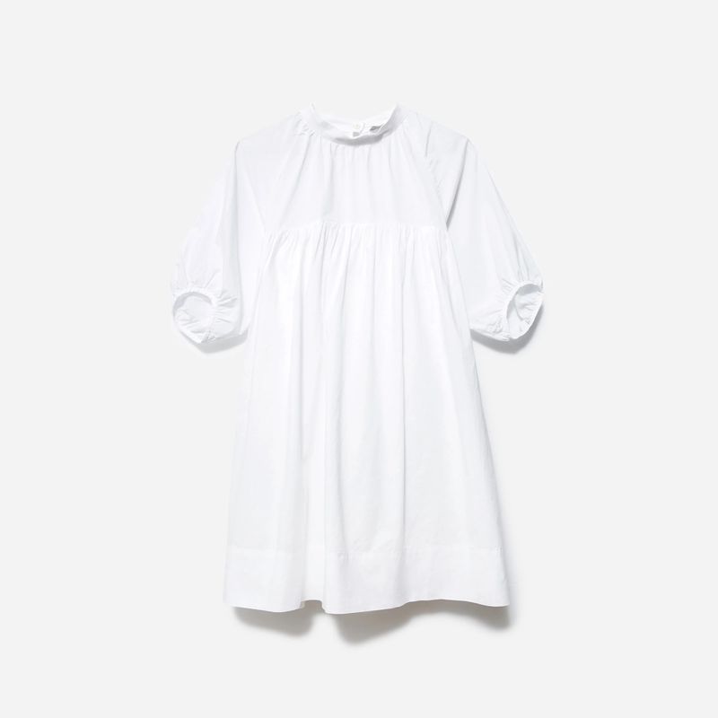 Біла гофрована міні-сукня