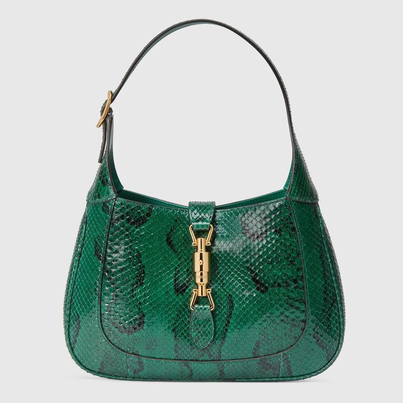 Vihreä Gucci-laukku vs. Versace-laukku