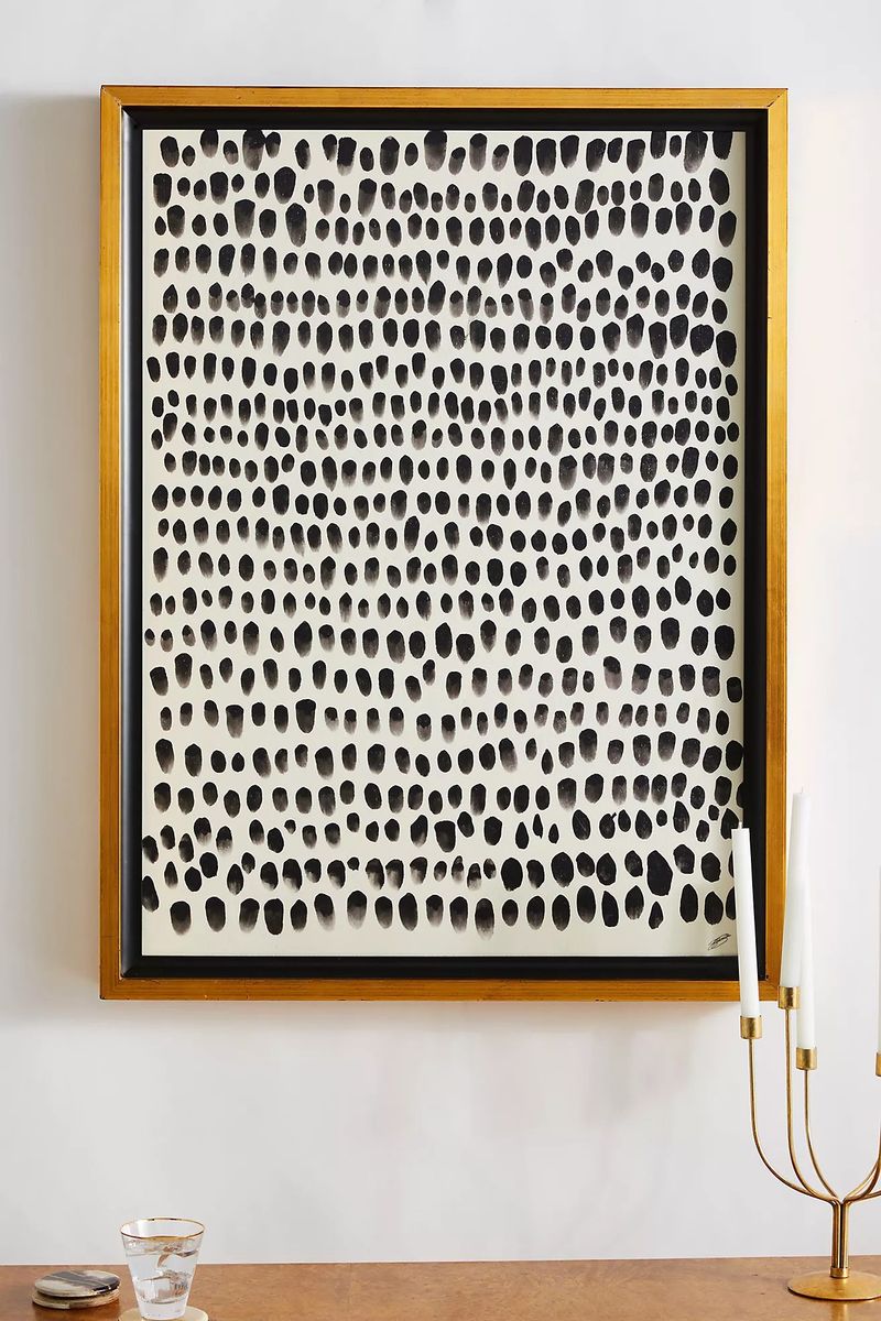 Abstrakt sort og hvid vægkunst med prikker