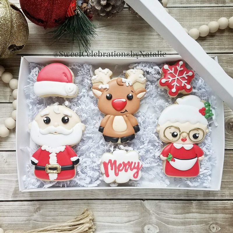 Mignons biscuits au sucre de Noël avec monsieur et madame Noël et Rodolphe