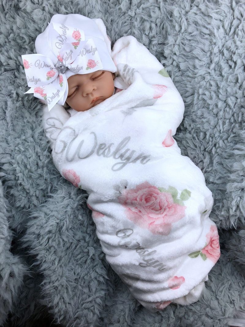 Couverture bébé blanche et rose pour nouveau-né